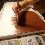 Lackieren der Rückwand mit Abtönfarbe